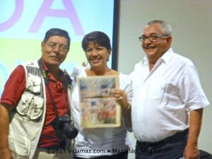 Sandra and Hector, center and right, with their first issue